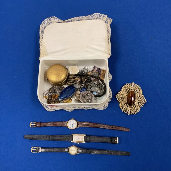 Vintage mixed jewellery and watch lot on a decorative tray.
