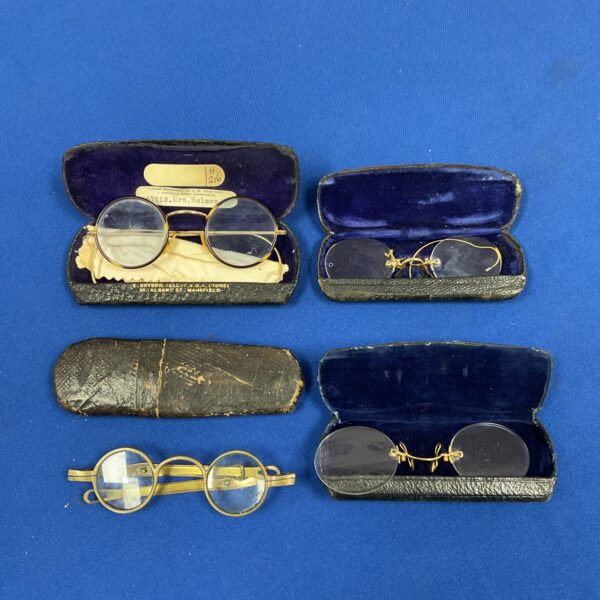 Lot of four vintage spectacles, antique eyewear collection.