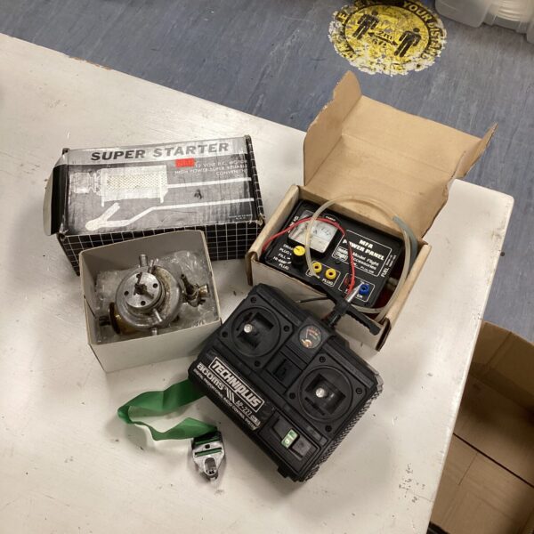 Vintage model boat accessories including a Super Starter unit.