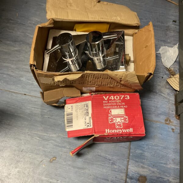 Vintage brass diverter valve V4073 in original packaging.
