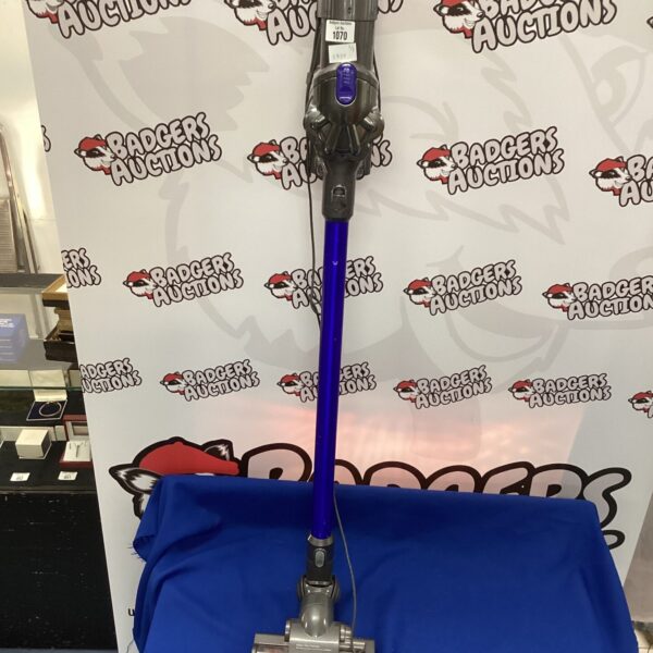 Purple Dyson V8 Absolute cordless stick vacuum cleaner for home cleaning.