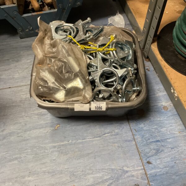 Assorted metal exhaust clamps for automotive exhaust repair.
