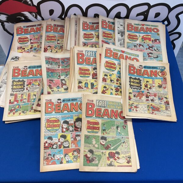 Stack of vintage 1980s Beano comics, featuring Dennis the Menace.