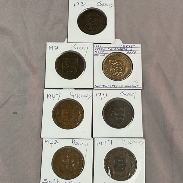 Vintage lot of Jersey and Guernsey pennies, collectible British coins.