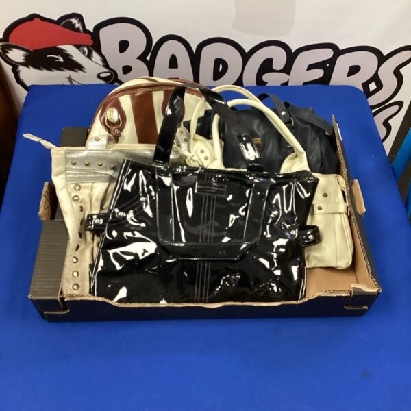 Vintage handbag lot featuring Paca Rabanne and France Lancine designs.