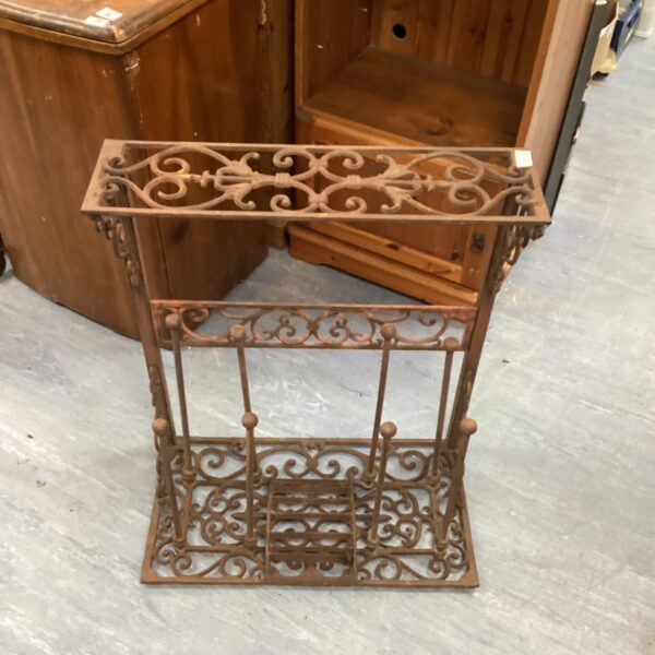 Victorian wrought iron boot scraper for cleaning footwear.