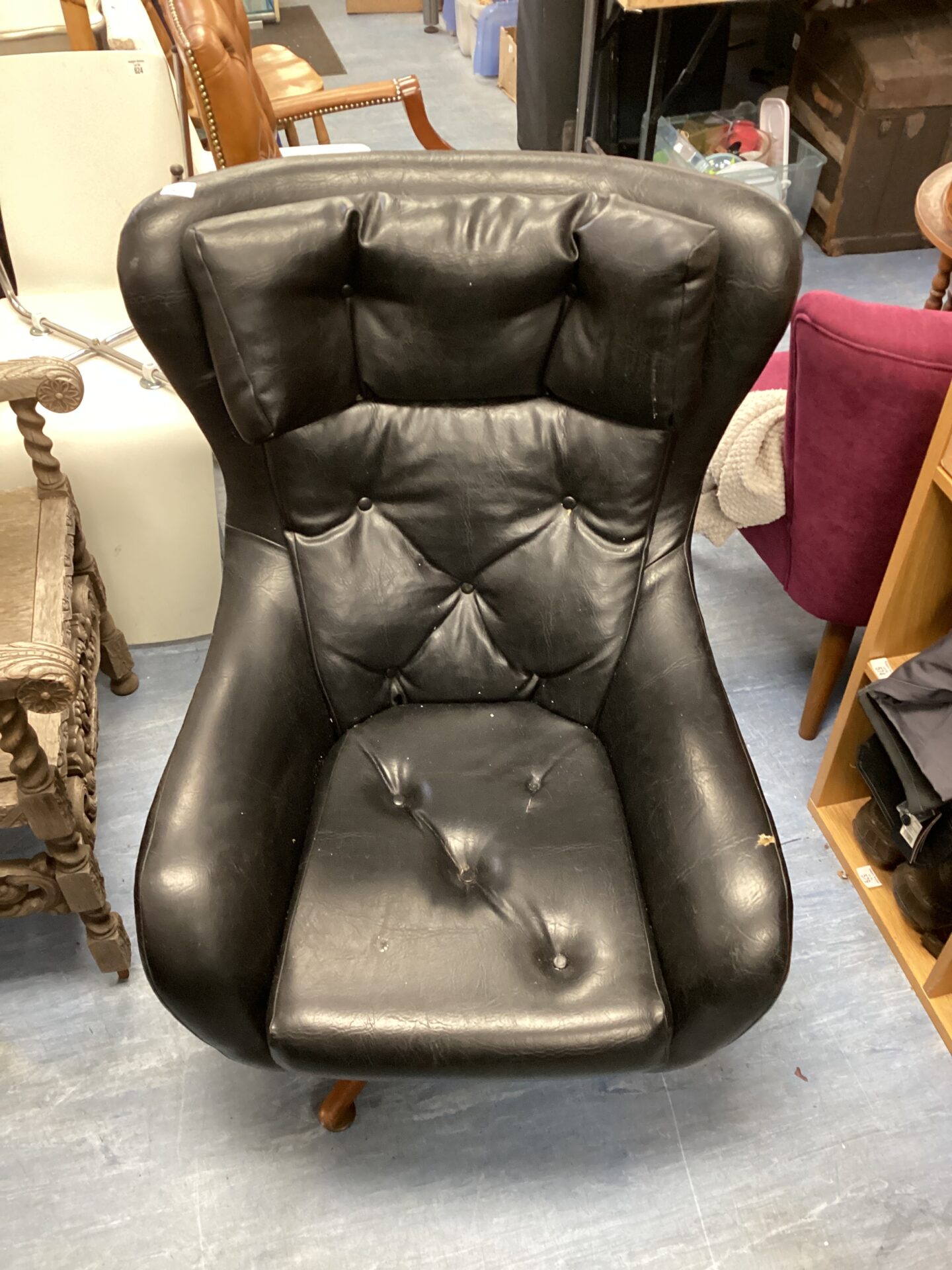 612 Black leather clubman chair needs attention