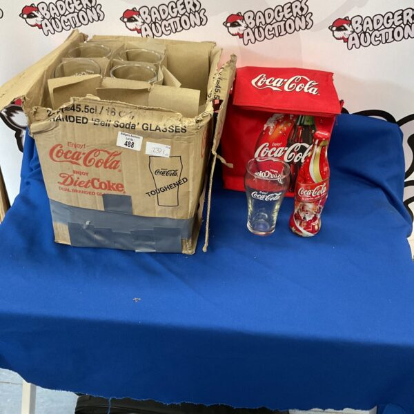Vintage Coca Cola collection featuring a box of glasses.