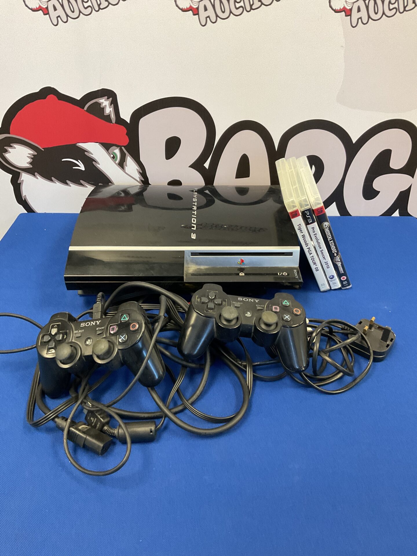 219 Sony PlayStation 3 console with pads, games & cables