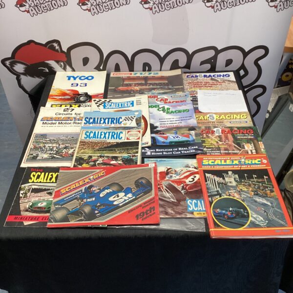 Selection of vintage Scalextric catalogues for model racing enthusiasts.