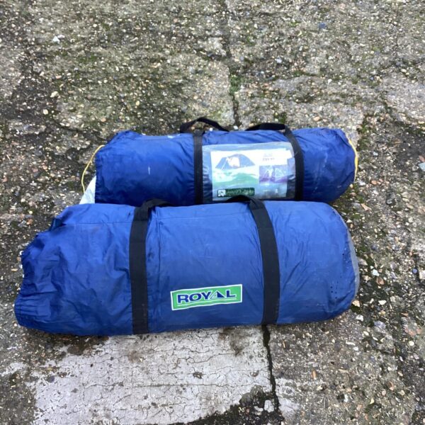 Two vintage tents in bags, including a Peakland model.