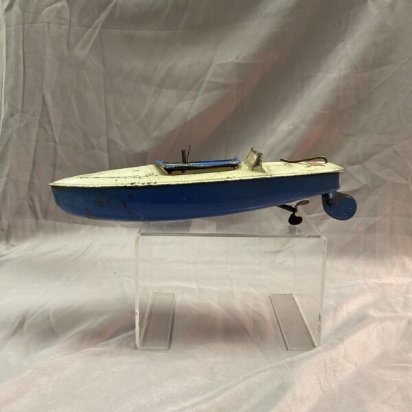 Vintage Hornby Meccano speedboat toy boat, side view.