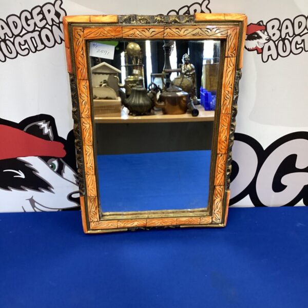 Colourful Moroccan mirror with bone and brass frame.