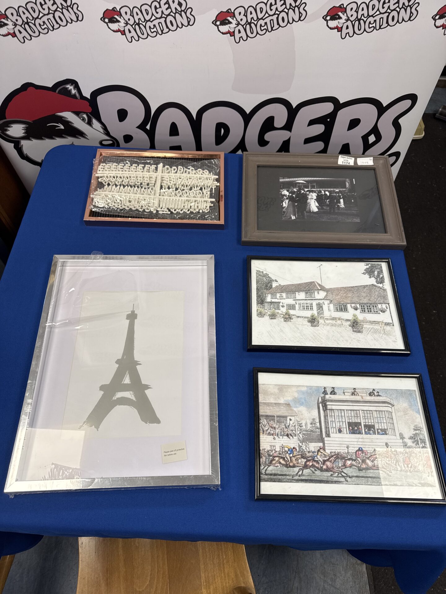1174 Selection of prints and a letterboard