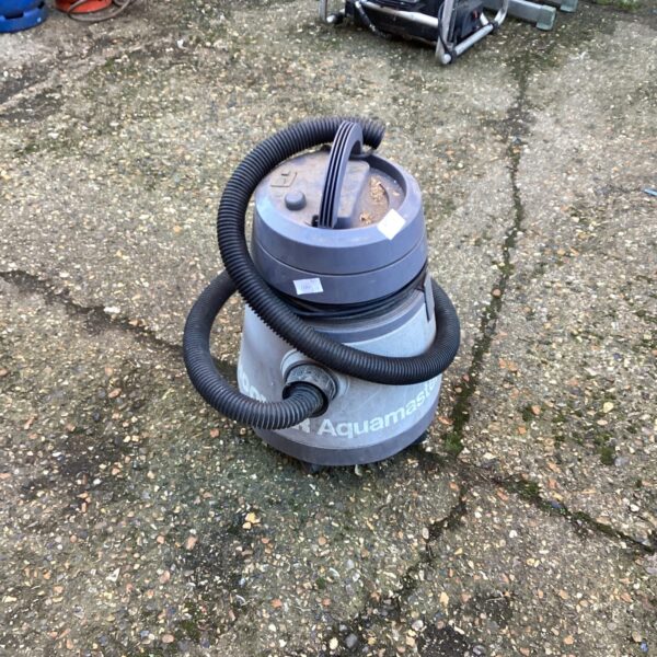 Vintage Hoover Aquamaster vacuum cleaner in used condition.