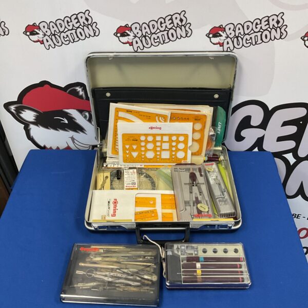 Open case of vintage Rotring drafting pens and technical drawing tools.