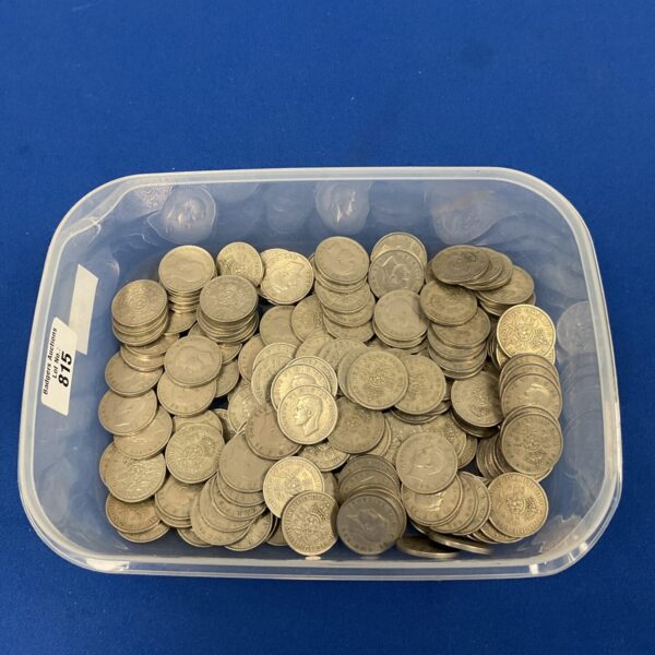 Tub of 2 shilling coins, British pre-decimal silver coinage.