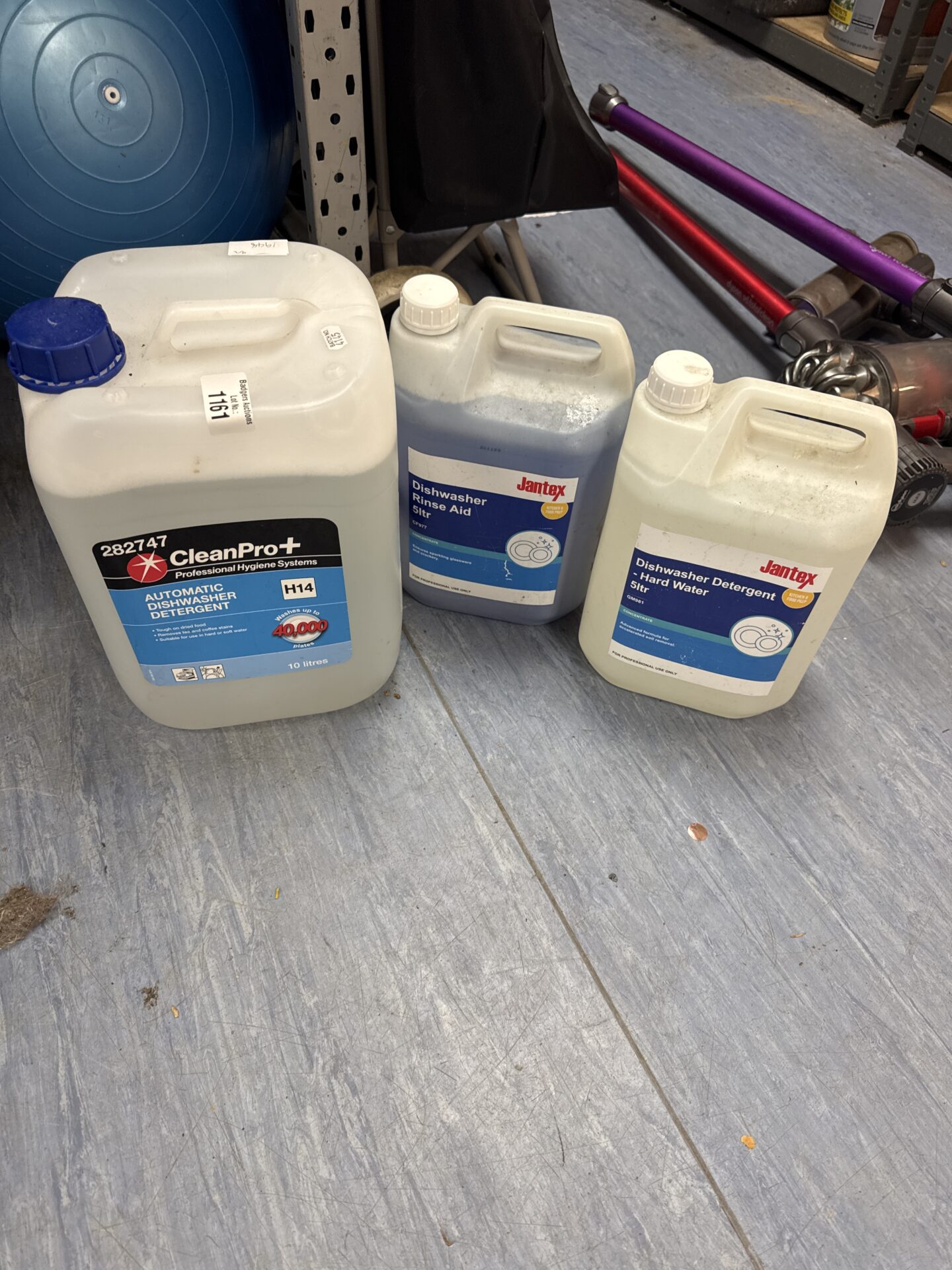 1161 Three bottles of dishwasher detergent
