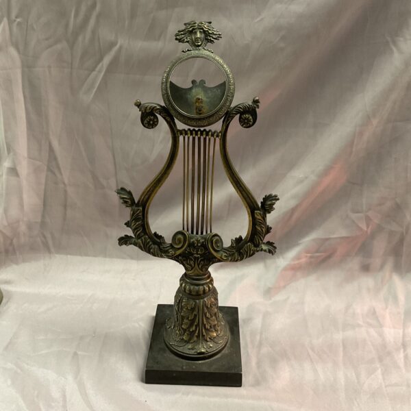 Antique brass lyre watch stand, Victorian desk display for pocket watches.