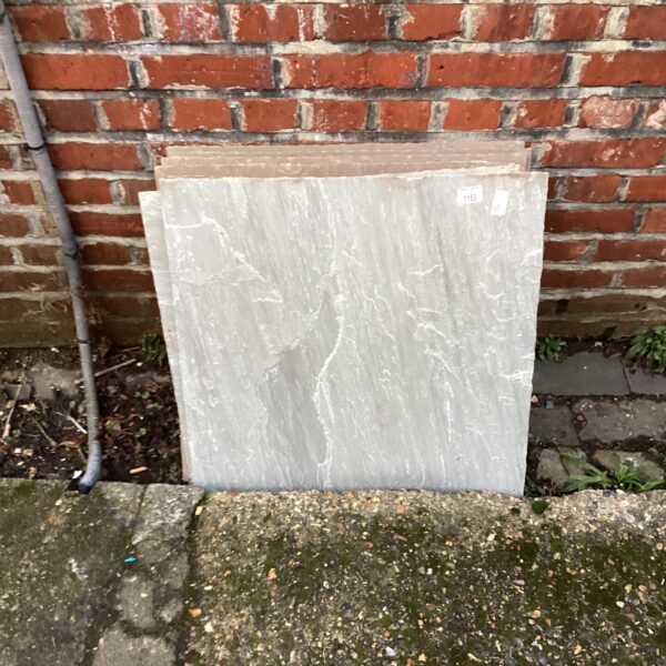 Grey paving stones for garden landscaping and patio projects.