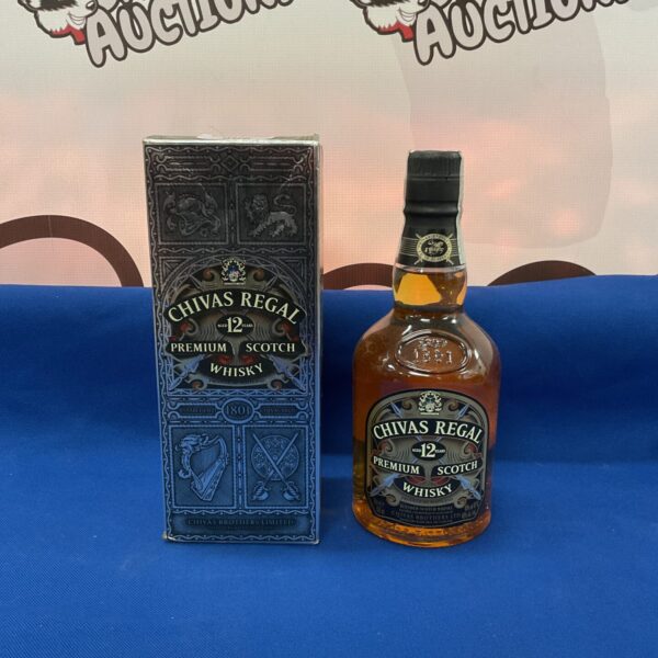 Chivas Regal 12 Year Old Scotch Whiskey bottle presented for auction.