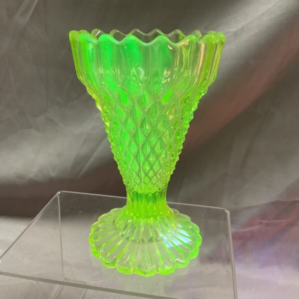 Vintage green uranium glass vase with diamond pattern.