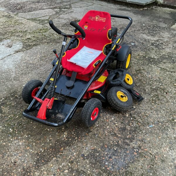 Red and black Wolf ride on gocart with spare wheels.