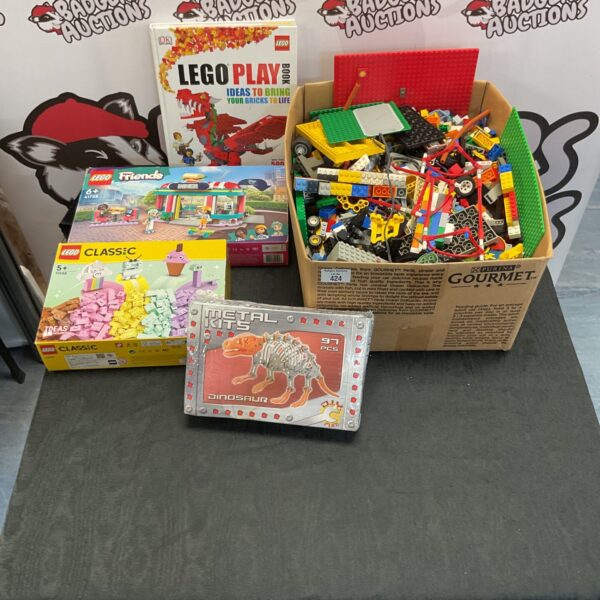 Large mixed Lego lot with colourful bricks and disassembled sets.