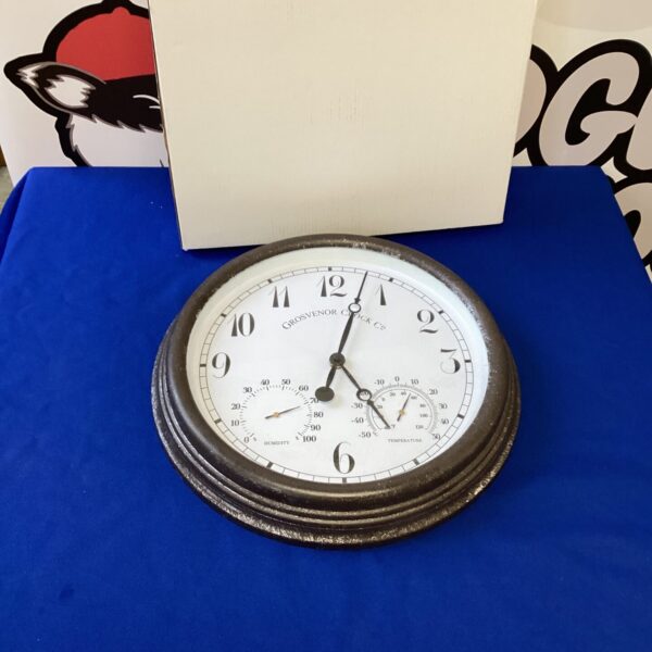 Reproduction Grosvenor wall clock with Roman numerals for vintage decor.