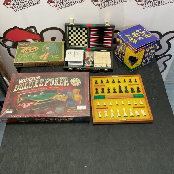 Vintage mixed games lot including table tennis and chess set.