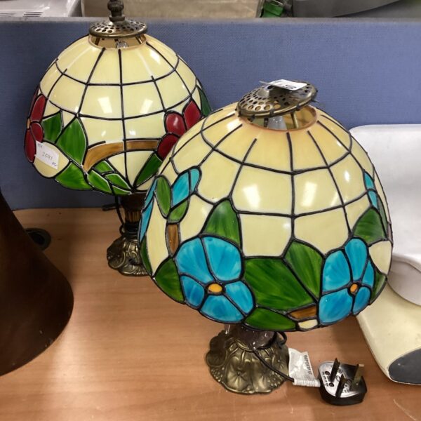 Pair of vintage Tiffany style table lamps with stained glass shades.