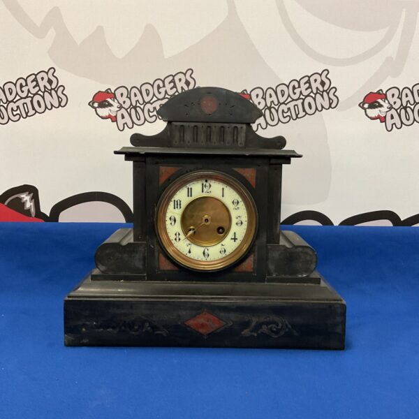 Antique Victorian French slate mantle clock with marble details.