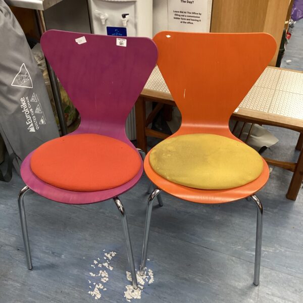 Vibrant orange vintage office chair with chrome legs.