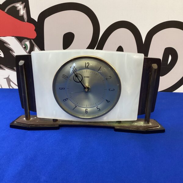 Vintage Metamic mantle clock with wooden and brass case.