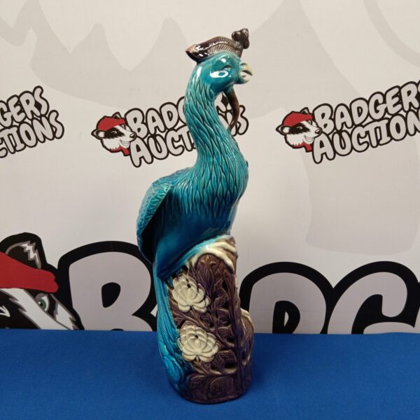 Vibrant mid-century Chinese porcelain phoenix bird sculpture.