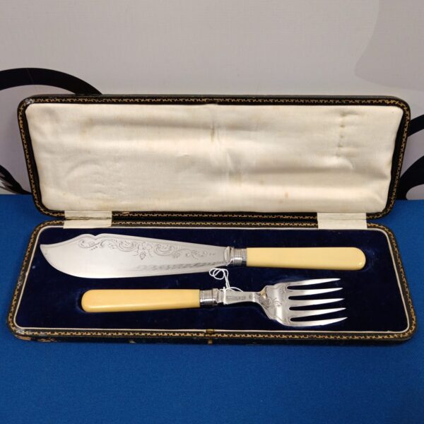 Vintage 1922 Sheffield silver plate cake server set with silver cuffs.