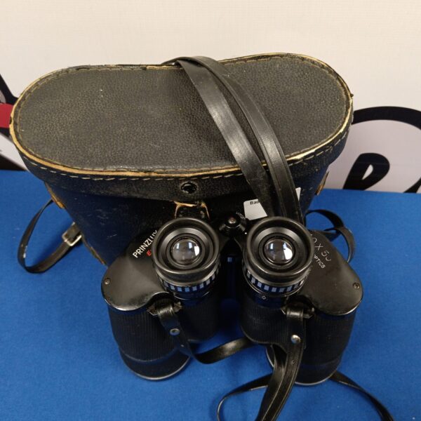 Vintage Prinzlux Extralite 10x50 binoculars in a worn case.