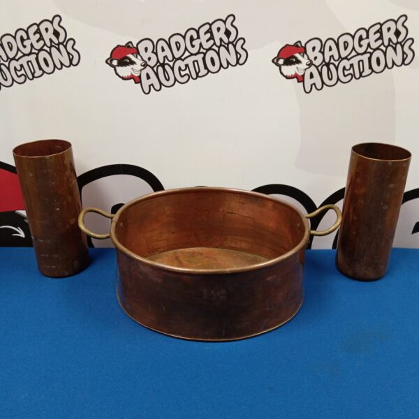 Antique copper pan with brass handles and two copper vases.