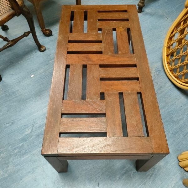 Rustic solid oak hall bench with slatted seat detail.