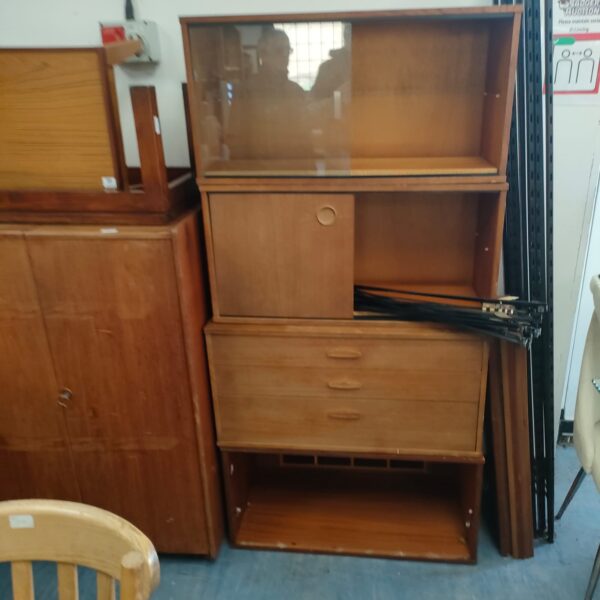 Vintage Avalon modular cabinet in warm wood tone.