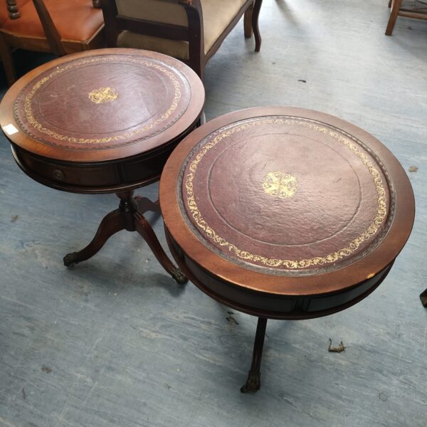 Vintage red leather top side tables with mahogany tripod legs.