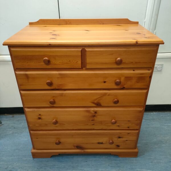 Vintage pine chest of drawers with two over four drawer configuration.