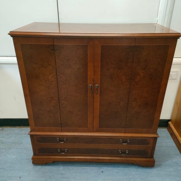Vintage burr walnut media cabinet with inlaid detailing, front view.