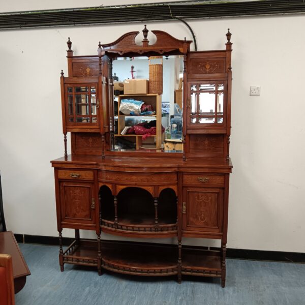 Antique Edwardian walnut display cabinet with inlaid detailing.