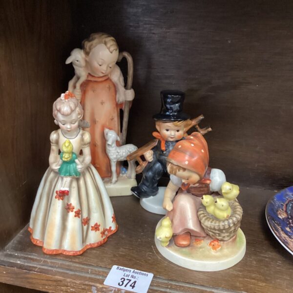 Vintage Goebel Hummel figurine of a girl with a flower basket.