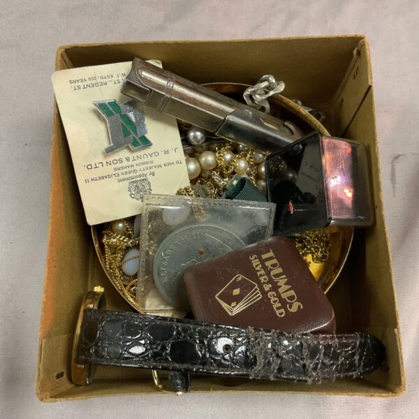 Vintage playing cards in a decorative box, antique collectible.