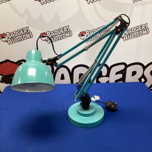 Blue vintage Anglepoise lamp with adjustable arm and shade.