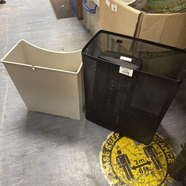 Two used office paper shredders for document destruction.