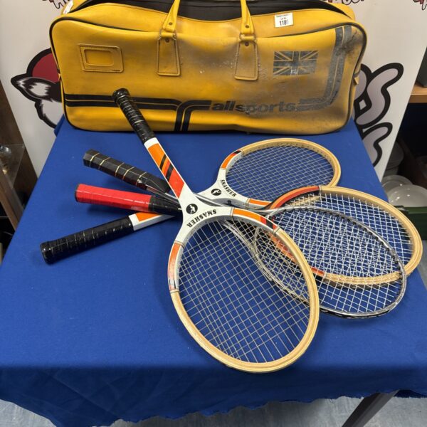 Vintage Allsports tennis bag with four wooden rackets inside.