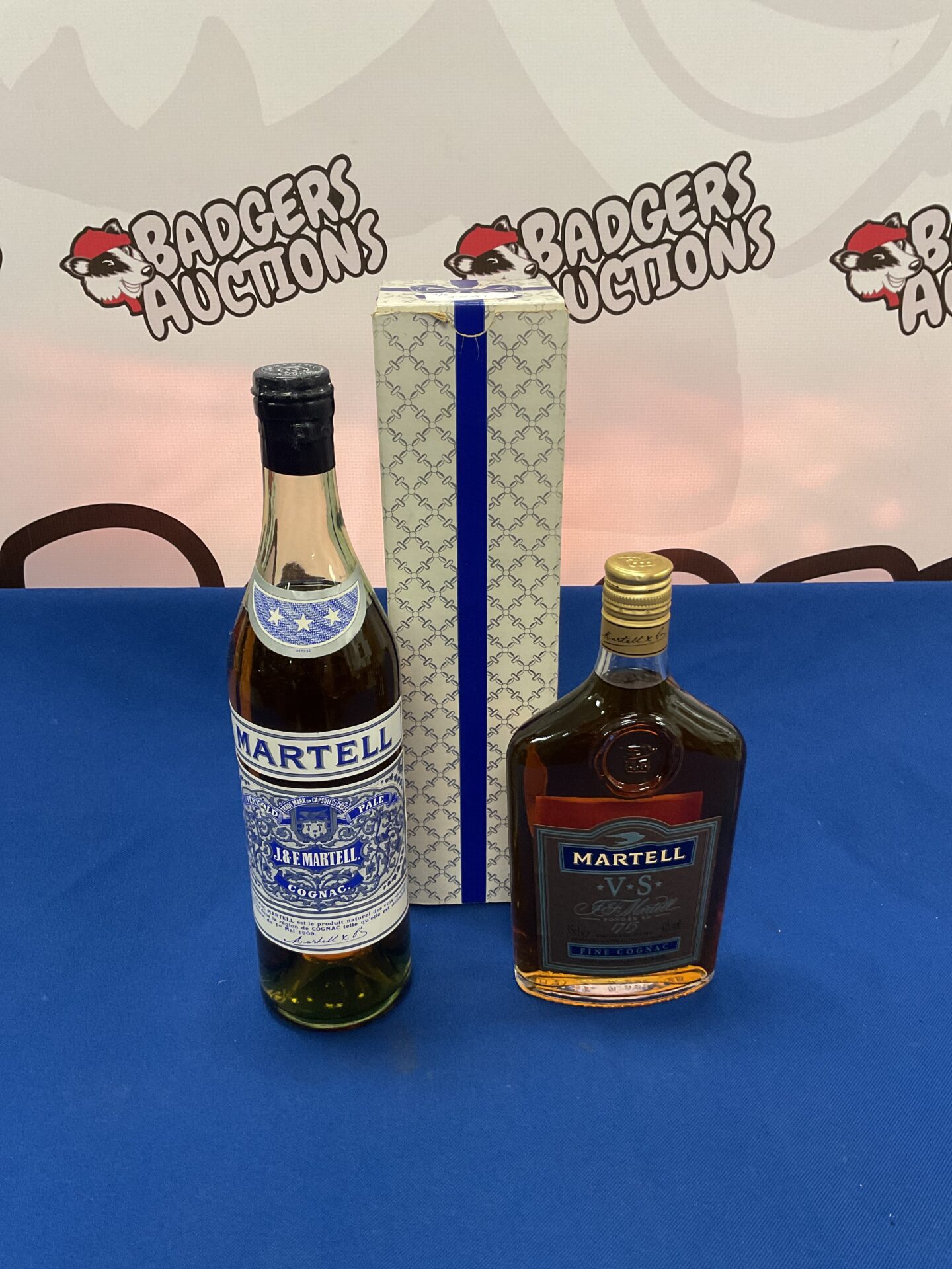 1006 Two Sealed bottles of martell fine cognac